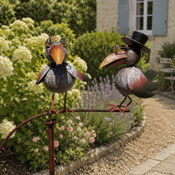 Deux corbeaux décoratifs en métal patiné