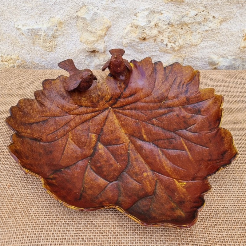 Mangeoire en forme de feuille couleur rouille patiné jaune