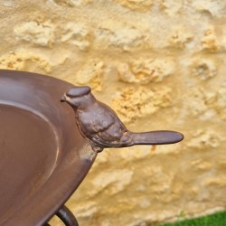 Bain d'oiseaux, mangeoire en fer sur trépied arabesques marron