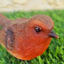 Oiseau en résine rouge