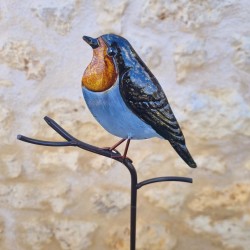 Oiseau décoratif sur pic orange