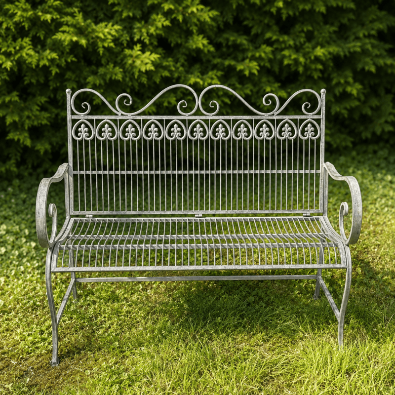 Banc de jardin ancien en métal patiné vert-de-gris