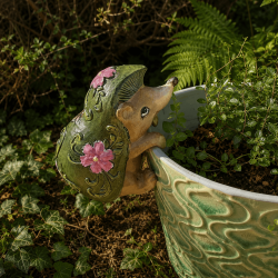 Animaux décoratifs suspendus à un cache-pot