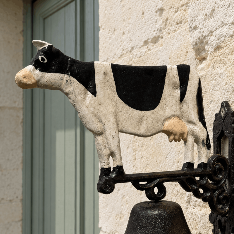 détail vache cloche de porte en fonte